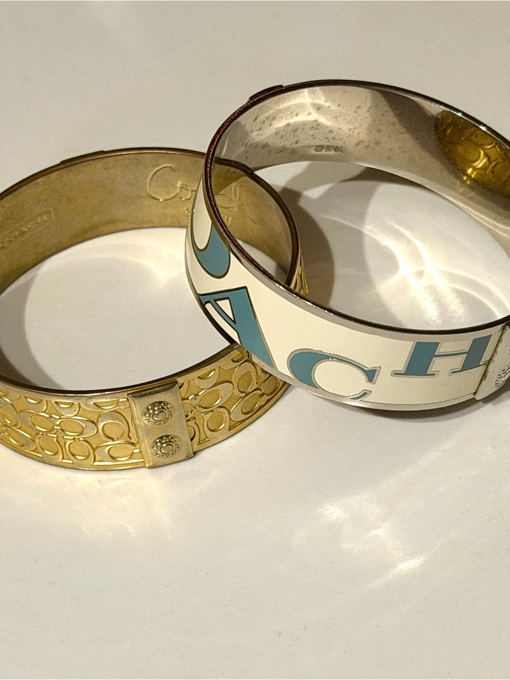 Coach Gold-Tone Cuff and White Enamel Logo Bracelet with blue lettering set - Picture 5 of 5